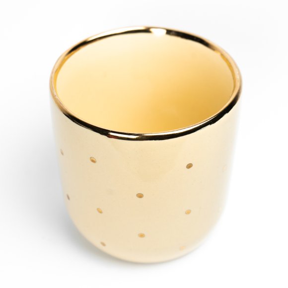 Стакан жовтий із золотою крапкою і золотим краєм: Фото